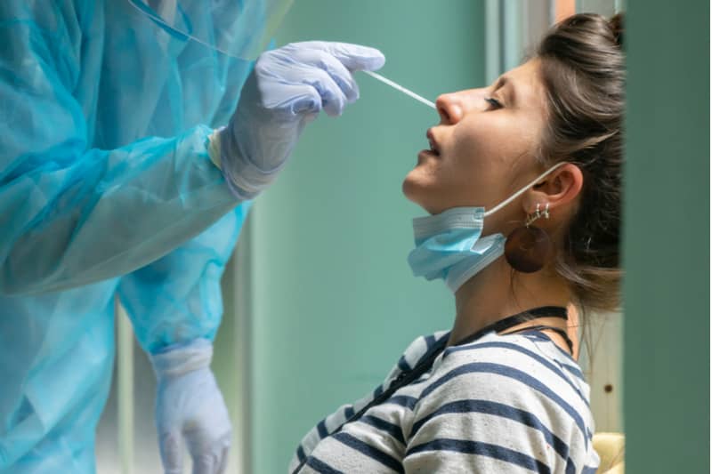 woman getting covid test