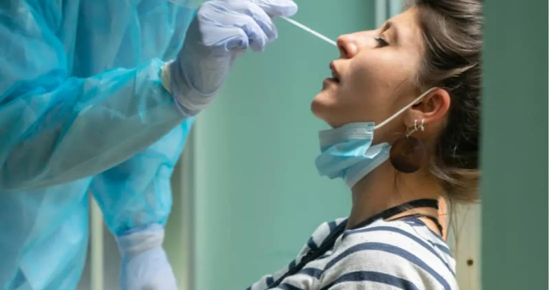 woman getting covid test