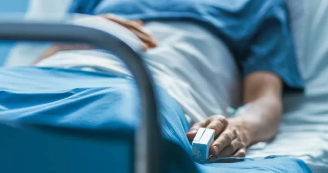 patient in hospital bed